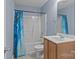 This bathroom features a bathtub, shower, toilet, and a modern sink with a wooden vanity at 112 St Vincent Pl, Mount Holly, NC 28120