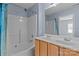 This bathroom features a double sink vanity, bathtub, and shower with blue curtain at 112 St Vincent Pl, Mount Holly, NC 28120