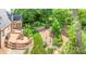 Expansive backyard with deck provides ample space for outdoor activities and serene enjoyment at 11724 Brambleton Ct, Charlotte, NC 28277