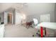 Bedroom featuring seating, ceiling fan, carpet floors, and white trim at 11724 Brambleton Ct, Charlotte, NC 28277