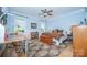 Cozy bedroom with a workspace, natural light, a ceiling fan and a comfortable atmosphere for relaxation at 11724 Brambleton Ct, Charlotte, NC 28277