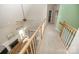 Upstairs hallway view showcases an open floor plan with a fireplace and built-in shelves at 11724 Brambleton Ct, Charlotte, NC 28277