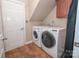 Functional laundry room with a washer, dryer, and ample storage space for convenience and organization at 11724 Brambleton Ct, Charlotte, NC 28277