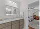 Bathroom features a marble countertop vanity and a bedroom view through the doorway at 1241 Rollins Ave, Charlotte, NC 28205