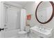 Bathroom featuring a tub, toilet, and sink at 1241 Rollins Ave, Charlotte, NC 28205