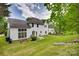 Large backyard with a well-maintained lawn and attractive landscaping at 12719 Vantage Point Ln, Huntersville, NC 28078