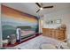 Bright Bedroom with colorful mural, hardwood floors and built-in dresser at 12719 Vantage Point Ln, Huntersville, NC 28078