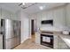 Updated kitchen featuring modern appliances, neutral paint and subway tile backsplash at 12719 Vantage Point Ln, Huntersville, NC 28078