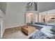 Spacious living room featuring high ceilings and large windows, plus a very large and comfortable sofa at 12719 Vantage Point Ln, Huntersville, NC 28078