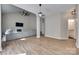 Bright living area with high vaulted ceilings, decorative ceiling fan, cozy fireplace, with views to multiple areas of the home at 12719 Vantage Point Ln, Huntersville, NC 28078