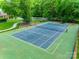Well-maintained community tennis court, providing opportunities for recreation and exercise at 12719 Vantage Point Ln, Huntersville, NC 28078