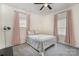 Bedroom with carpeted floors, neutral walls, and bright light at 131 Swink Sw St, Concord, NC 28027