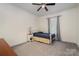 Bedroom featuring carpet, ceiling fan, and natural light at 131 Swink Sw St, Concord, NC 28027