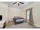 Bedroom features carpet, a ceiling fan, and ample natural light at 131 Swink Sw St, Concord, NC 28027