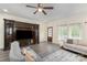 Cozy living room with hardwood floors, custom built-ins, and neutral decor at 131 Swink Sw St, Concord, NC 28027