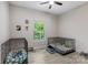 Neutral room with two dog kennels, a ceiling fan, light gray walls and a window with a view at 141 Ole Eastpointe Dr, York, SC 29745