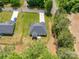Birds-eye view of a home with a well-manicured lawn and a lengthy driveway at 142 Highland Dr, New London, NC 28127