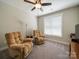 Bedroom with two plush recliner chairs and ceiling fan at 142 Highland Dr, New London, NC 28127