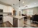 Beautiful kitchen featuring granite countertops, stainless appliances, and an open layout that seamlessly connects to the living area at 142 Highland Dr, New London, NC 28127