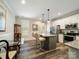 Bright kitchen with stainless steel appliances, granite countertops, and eat-in island at 142 Highland Dr, New London, NC 28127