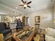 Spacious open-plan living room with kitchen and classic decor at 142 Highland Dr, New London, NC 28127