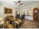 Open-concept living room flowing into a stylish kitchen area at 142 Highland Dr, New London, NC 28127