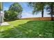 The expansive, well-maintained backyard is perfect for outdoor activities, gardening, or simply enjoying nature at 146 Burtons Barn Rd, Mooresville, NC 28115