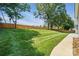 The grassy backyard is bordered by a wooden fence that is sure to give you the privacy you desire at 146 Burtons Barn Rd, Mooresville, NC 28115