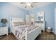 This secondary bedroom is well-lit and features a ceiling fan and closet at 146 Burtons Barn Rd, Mooresville, NC 28115