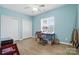This secondary bedroom features hardwood floors and a ceiling fan at 146 Burtons Barn Rd, Mooresville, NC 28115