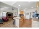 Open kitchen featuring an island with barstool seating and stainless steel appliances at 146 Burtons Barn Rd, Mooresville, NC 28115