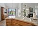 The kitchen sink features white countertops and views of the backyard at 146 Burtons Barn Rd, Mooresville, NC 28115