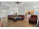 Open-concept living room with hardwood floors and easy access to the kitchen at 146 Burtons Barn Rd, Mooresville, NC 28115