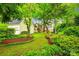 Lush backyard featuring a well-maintained lawn and beautiful landscaping at 1581 Granville Rd, Rock Hill, SC 29732