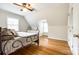 Bright bedroom featuring hardwood floors, a large window, and neutral colors at 1581 Granville Rd, Rock Hill, SC 29732