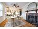 Elegant dining room with a fireplace, modern table, and views into the adjacent kitchen at 1581 Granville Rd, Rock Hill, SC 29732