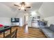Loft living room featuring hardwood floors, natural light, and a small kitchenette at 1581 Granville Rd, Rock Hill, SC 29732