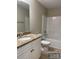 Bathroom featuring a granite countertop vanity, modern fixtures, and a combined shower and tub at 1669 California Rd, York, SC 29745