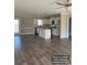 Spacious open-concept kitchen featuring a center island, stainless steel appliances, and ample counter space at 1669 California Rd, York, SC 29745