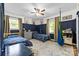 Charming bedroom featuring paneled walls, two beds, and a hanging swing chair at 206 Pelham Ln, Fort Mill, SC 29715