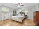 Bright bedroom featuring a comfortable bed, dresser, and natural light at 206 Pelham Ln, Fort Mill, SC 29715