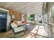 Covered patio with seating area, tv, and refrigerator, perfect for outdoor entertaining and relaxation at 206 Pelham Ln, Fort Mill, SC 29715