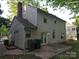 Back of home featuring a patio and simple yard, offering potential for outdoor enjoyment at 2105 Killarney Pl, Charlotte, NC 28262