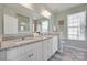 Bathroom with double granite vanity and large mirror at 217 Barberry Dr, Belmont, NC 28012