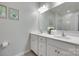 Bright bathroom with double sinks, a large mirror, and stylish fixtures at 217 Barberry Dr, Belmont, NC 28012