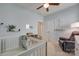 Well-lit Bedroom featuring a crib, comfortable chair, and ample storage with natural light at 217 Barberry Dr, Belmont, NC 28012
