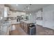 Modern kitchen with a large island, stainless steel appliances, and plenty of storage space at 217 Barberry Dr, Belmont, NC 28012