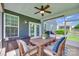 Inviting screened-in porch with a dining table, seating, and peaceful backyard views at 217 Barberry Dr, Belmont, NC 28012