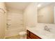 Bright bathroom featuring a shower-tub combination and vanity with a large mirror at 2327 Glenway Trail Ct, Pineville, NC 28134
