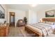 Virtual staged bedroom with plenty of natural light, creating a warm and inviting atmosphere at 2327 Glenway Trail Ct, Pineville, NC 28134